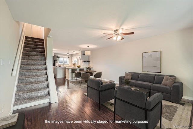 6492 Simms St Unit A, Arvada, CO 80004 - living room with stairs, ceiling fan, and dark wood-style floors