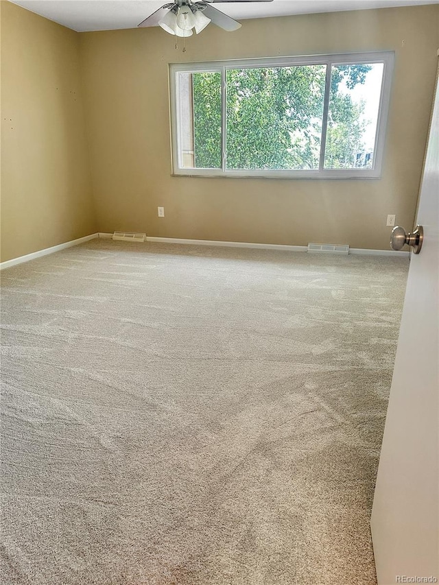 6492 Simms St Unit A, Arvada, CO 80004 - carpeted empty room featuring a ceiling fan and baseboards