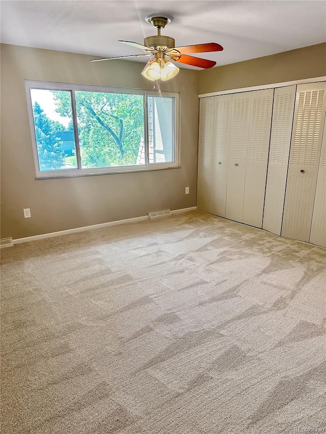 6492 Simms St Unit A, Arvada, CO 80004 - unfurnished bedroom with carpet floors and ceiling fan