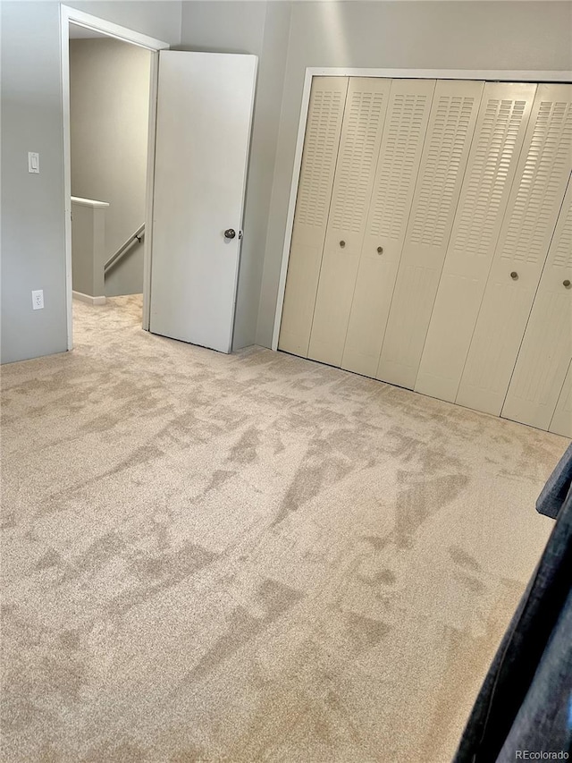 6492 Simms St Unit A, Arvada, CO 80004 - unfurnished bedroom with carpet floors and a closet