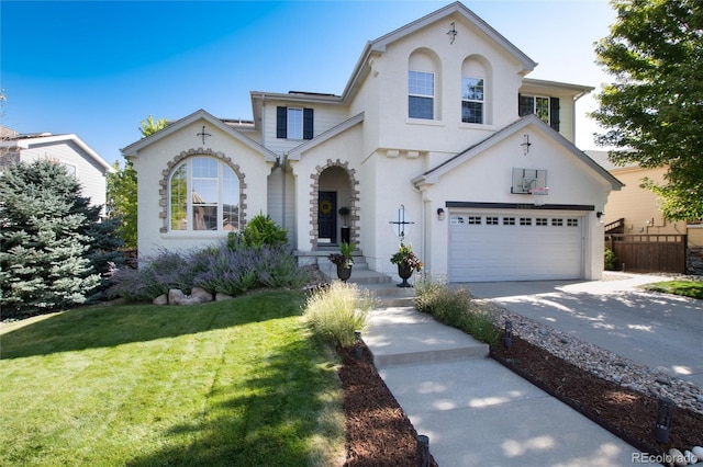 2880 Breezy Ln, Castle Rock, CO 80109 - view of front facade featuring stucco siding, concrete driveway, and an attached garage