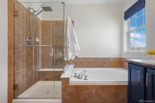 2880 Breezy Ln, Castle Rock, CO 80109 - bathroom featuring a bath, a stall shower, and vanity