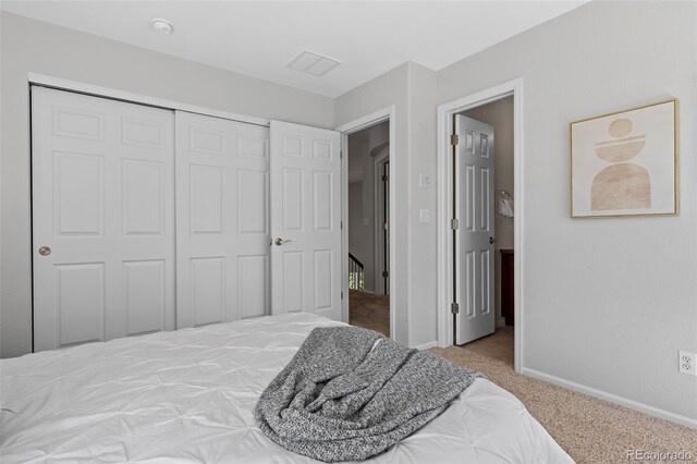 2880 Breezy Ln, Castle Rock, CO 80109 - bedroom featuring carpet flooring, a closet, and baseboards