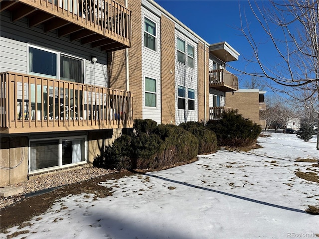 view of snow covered property