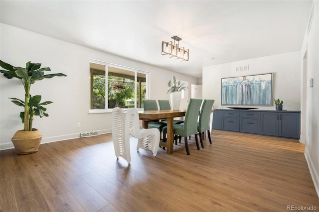 1420 W Ridge Rd, Littleton, CO 80120 - dining area featuring light wood-style floors and baseboards