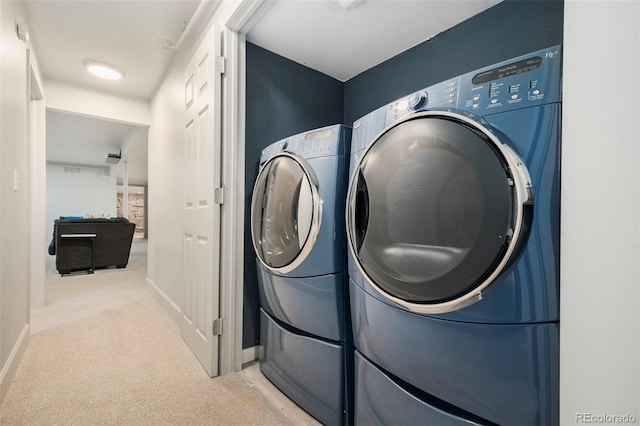 1420 W Ridge Rd, Littleton, CO 80120 - washroom with light colored carpet, baseboards, and independent washer and dryer