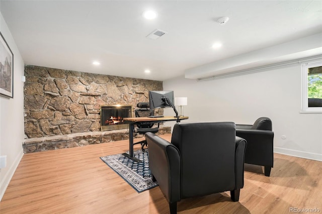 1420 W Ridge Rd, Littleton, CO 80120 - cinema featuring baseboards, a stone fireplace, wood finished floors, and recessed lighting