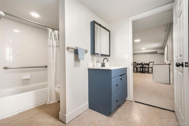 1420 W Ridge Rd, Littleton, CO 80120 - full bathroom with vanity, shower / tub combo, toilet, baseboards, and recessed lighting