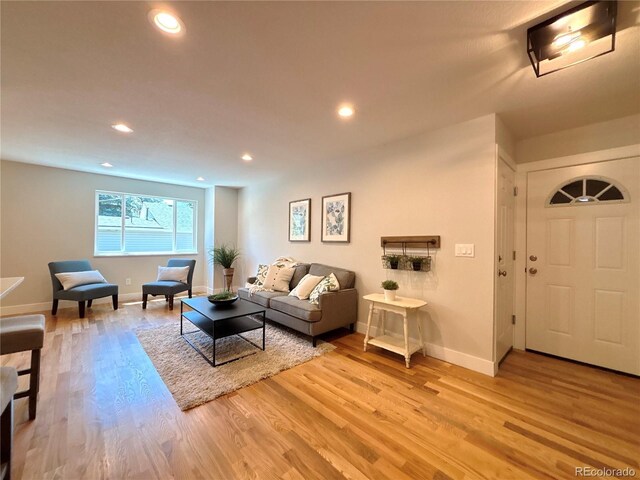 6484 S Datura St, Littleton, CO 80120 - living area featuring light wood-type flooring and recessed lighting