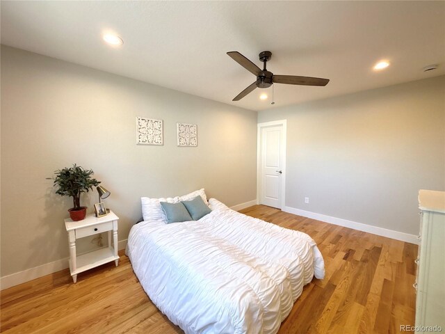 6484 S Datura St, Littleton, CO 80120 - bedroom with light wood-style flooring, recessed lighting, and a ceiling fan