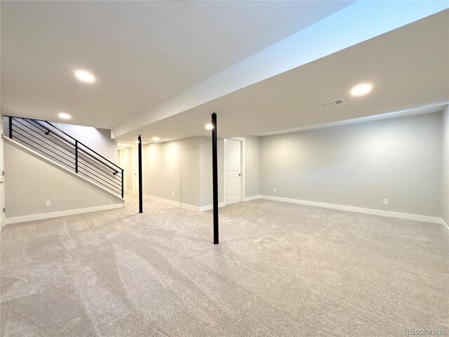 6484 S Datura St, Littleton, CO 80120 - finished basement featuring carpet flooring, recessed lighting, and stairway