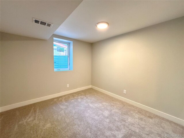 6484 S Datura St, Littleton, CO 80120 - carpeted empty room featuring baseboards