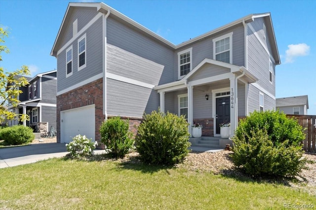 13644 Ulster St, Thornton, CO 80602 - view of front of property featuring an attached garage, a front yard, brick siding, and asphalt driveway