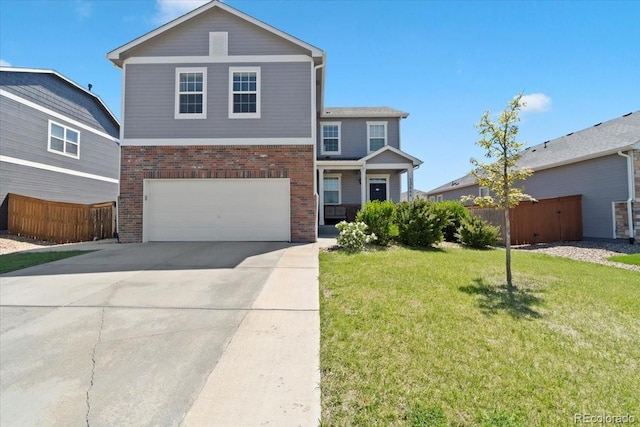 13644 Ulster St, Thornton, CO 80602 - traditional home with brick siding, a garage, and driveway