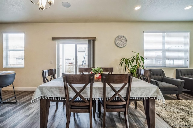 13644 Ulster St, Thornton, CO 80602 - dining area with dark wood finished floors, baseboards, and recessed lighting