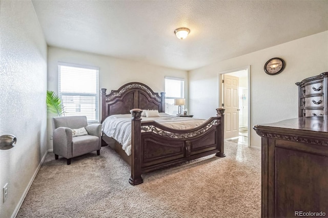 13644 Ulster St, Thornton, CO 80602 - bedroom featuring baseboards, light carpet, a textured ceiling, and a textured wall
