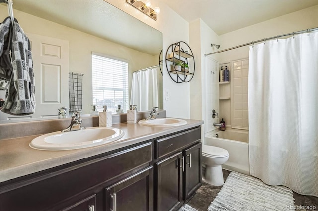 13644 Ulster St, Thornton, CO 80602 - bathroom with toilet, double vanity, and shower / bathtub combination with curtain