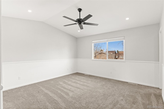 carpeted spare room with recessed lighting, baseboards, ceiling fan, and vaulted ceiling