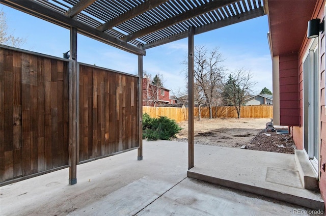 view of patio / terrace with a pergola and a fenced backyard