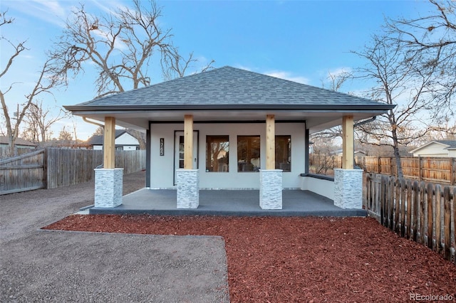 rear view of property featuring a patio