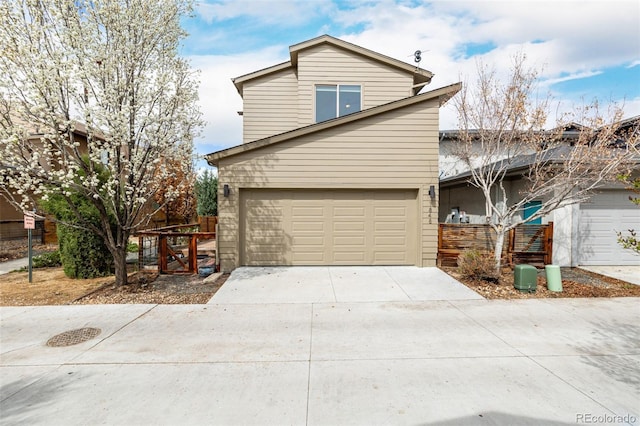 1848 W 68th Ave, Denver, CO 80221 - view of front of property with a garage and driveway