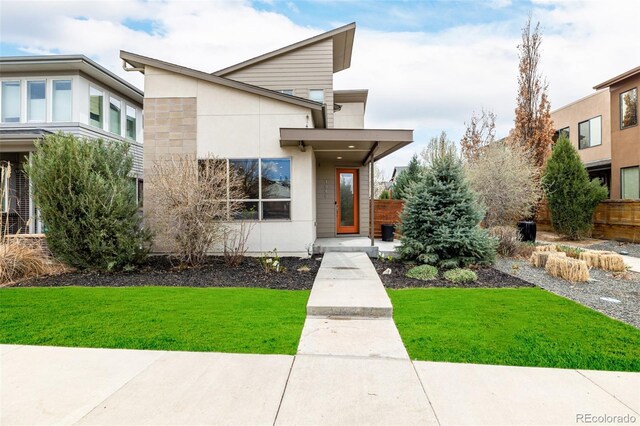 1848 W 68th Ave, Denver, CO 80221 - contemporary home with a front yard and stucco siding