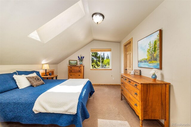 146 Atoka Dr, Como, CO 80432 - bedroom with light colored carpet, vaulted ceiling, and a skylight