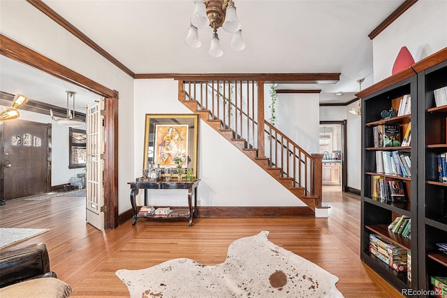 interior space featuring ornamental molding and wood-type flooring