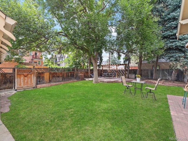 view of yard featuring a pergola and a patio area