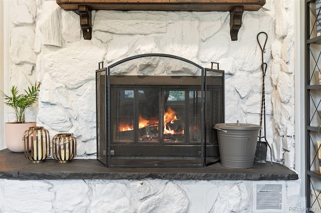 interior details featuring a fireplace