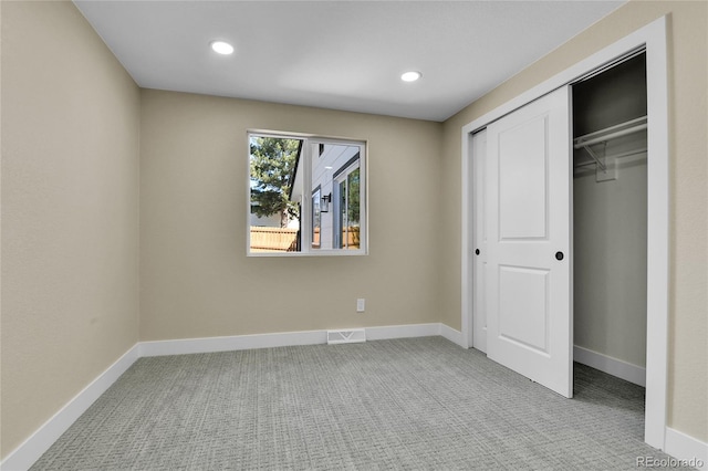 10431 Holland St, Broomfield, CO 80021 - unfurnished bedroom featuring carpet, baseboards, a closet, and recessed lighting