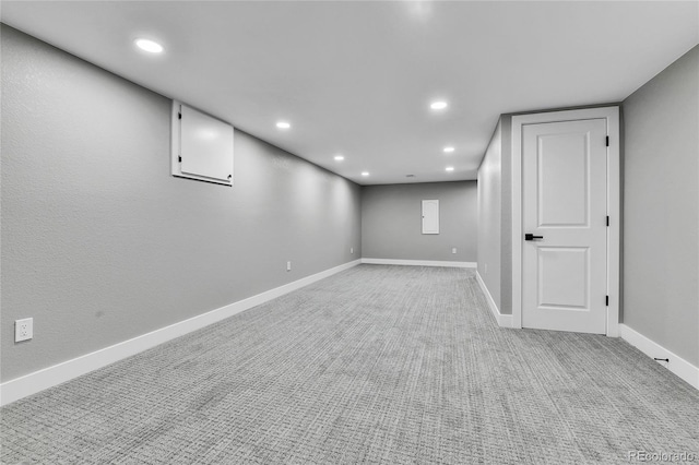 10431 Holland St, Broomfield, CO 80021 - finished basement featuring light colored carpet, recessed lighting, and baseboards