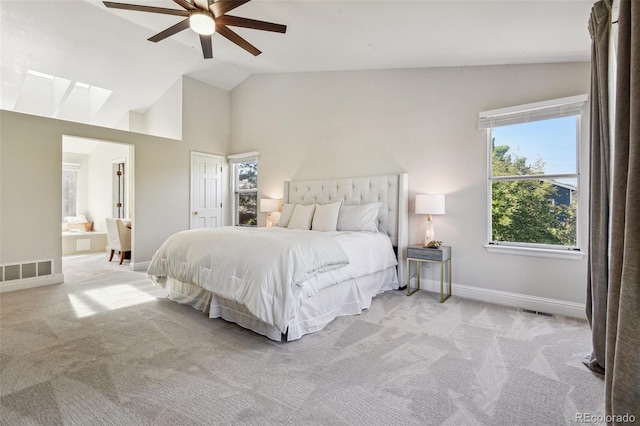 carpeted bedroom featuring ceiling fan and lofted ceiling