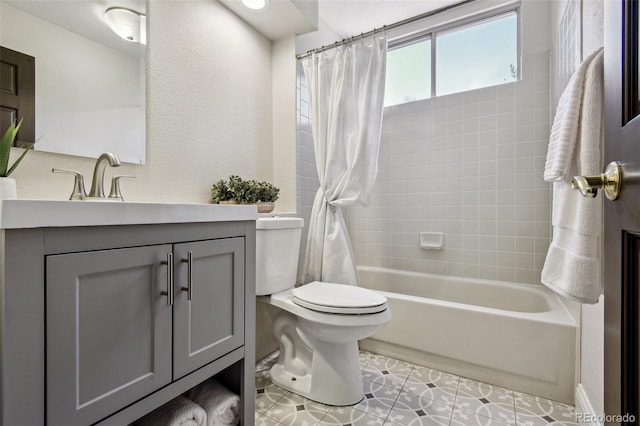 full bathroom with tile patterned floors, vanity, toilet, and shower / bath combo