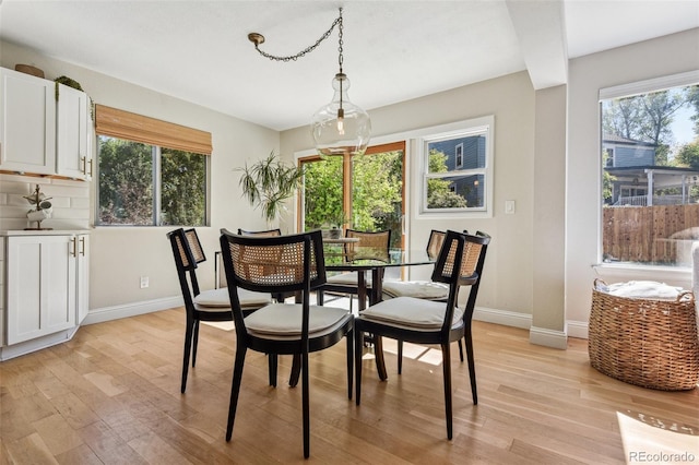 dining space featuring light hardwood / wood-style floors