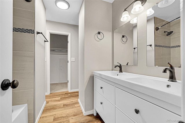 3890 S Atchison Way Unit B, Aurora, CO 80014 - full bath featuring double vanity and wood finished floors