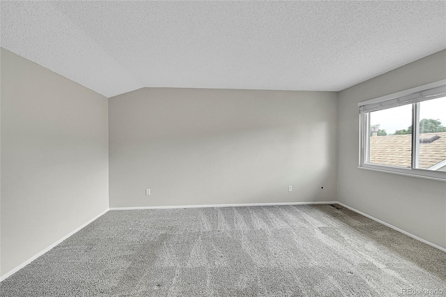 3890 S Atchison Way Unit B, Aurora, CO 80014 - unfurnished room with carpet, a textured ceiling, and lofted ceiling