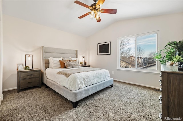 carpeted bedroom featuring lofted ceiling, ceiling fan, and baseboards