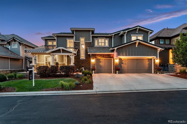 craftsman inspired home with a garage