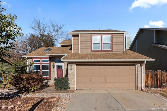 front of property with a garage