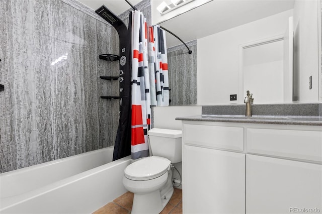 full bathroom featuring tile patterned flooring, shower / tub combo, vanity, and toilet