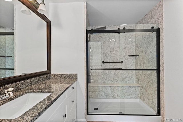 bathroom featuring vanity and walk in shower