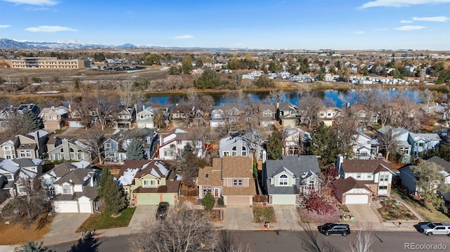 bird's eye view featuring a water and mountain view