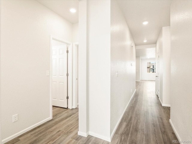 hallway featuring hardwood / wood-style floors