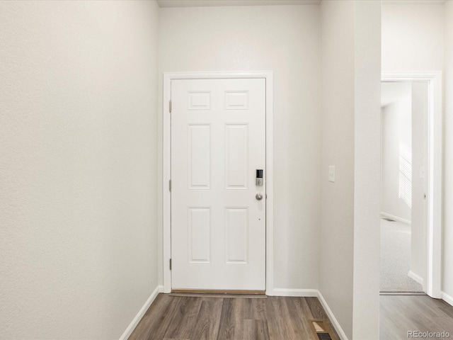 doorway featuring hardwood / wood-style floors