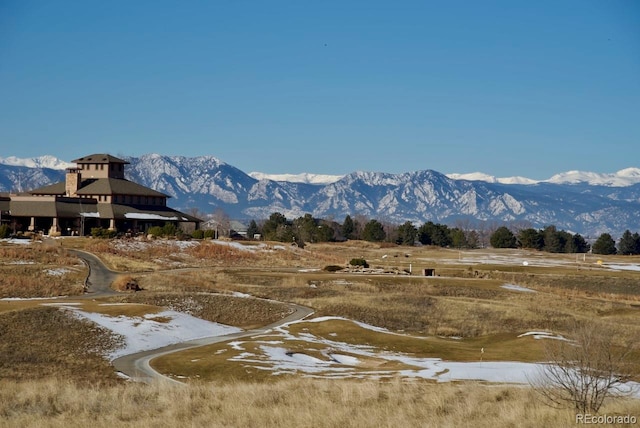 mountain view featuring a rural view