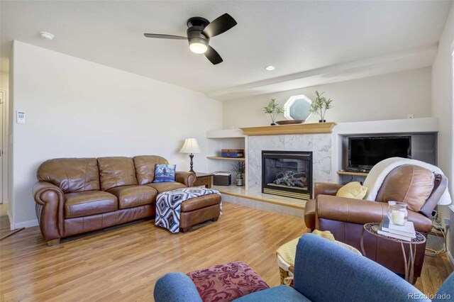 1944 Queens Canyon Ct, Colorado Springs, CO 80921 - living room with recessed lighting, a ceiling fan, wood finished floors, and a premium fireplace