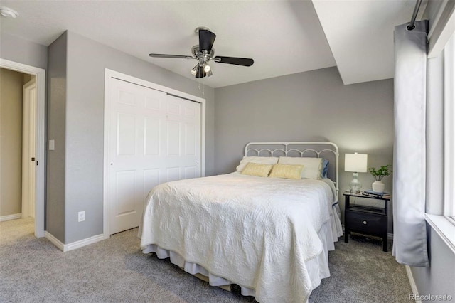1944 Queens Canyon Ct, Colorado Springs, CO 80921 - carpeted bedroom with a closet, baseboards, and ceiling fan