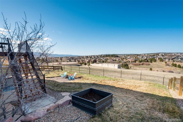 1944 Queens Canyon Ct, Colorado Springs, CO 80921 - view of yard with a rural view, fence, and a vegetable garden