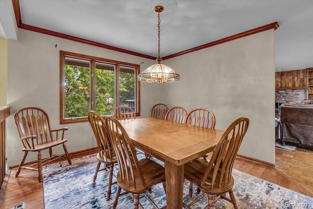 1665 W 113th Ave, Denver, CO 80234 - dining area with baseboards and ornamental molding